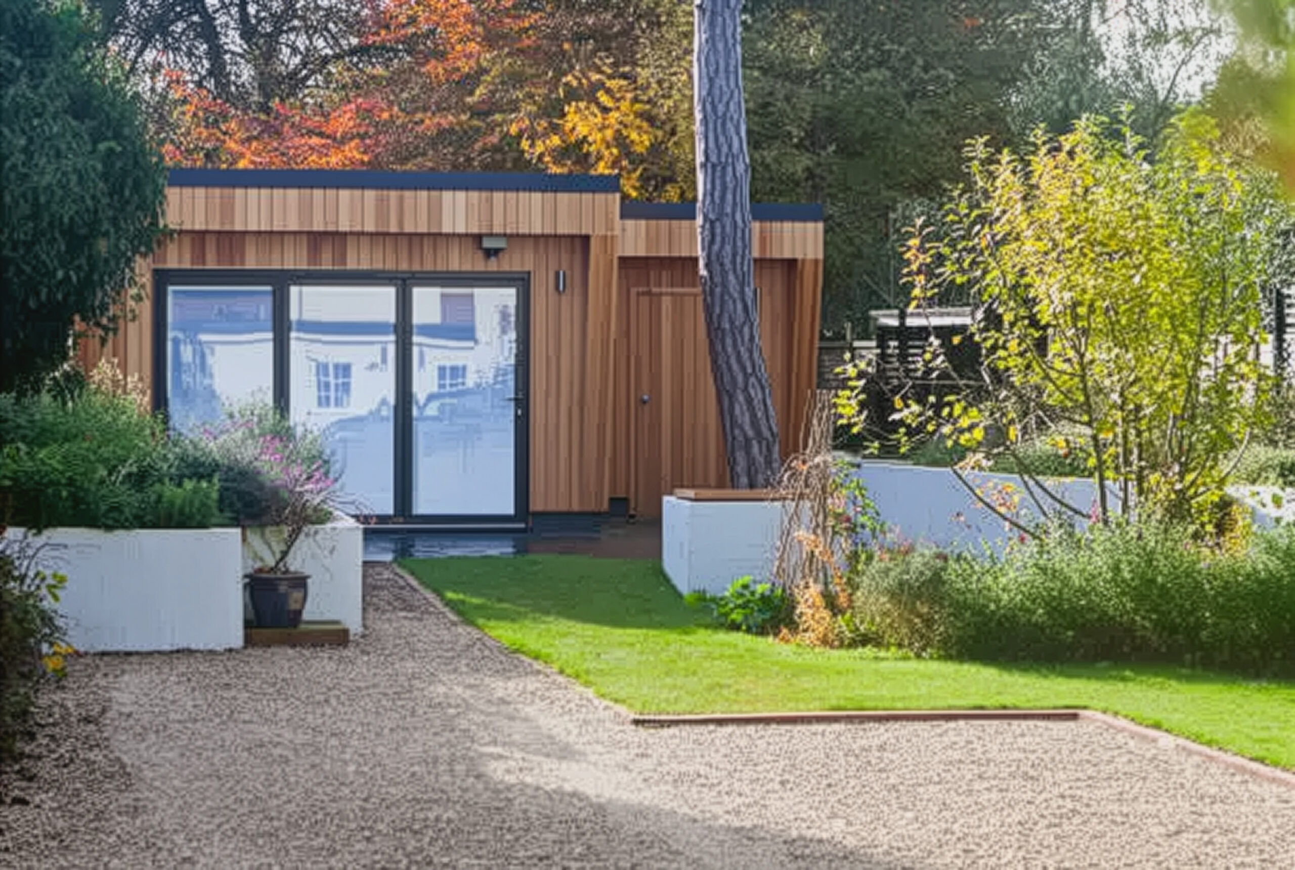 garden room person holding green plant on black pot